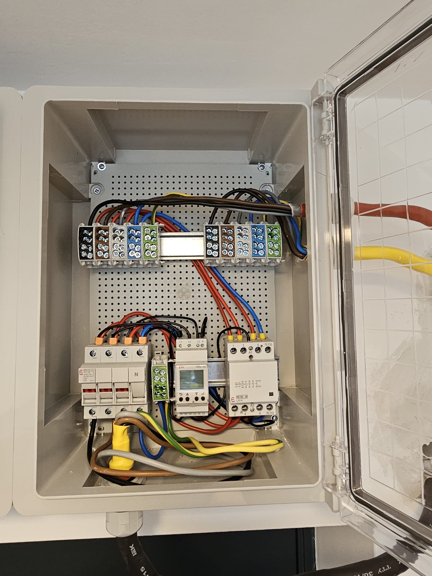 Main connection and first split to the PV inverter and the return for the fuseboard